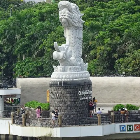 The white marble carp turning into a dragon, on its dark stone base by the Han River