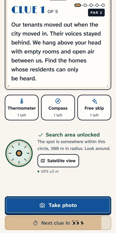 The Competitive stop screen: the Thermometer, Compass and Free skip lifelines, the search area unlocked, a 300 m circle, and the next clue counting down