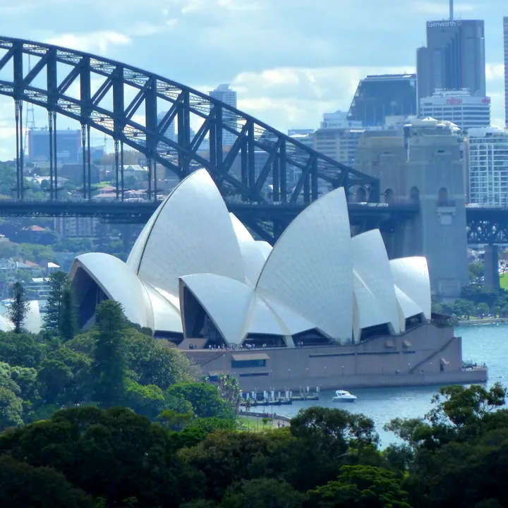 The finished puzzle: the white Opera House sails and the Harbour Bridge over blue harbour water